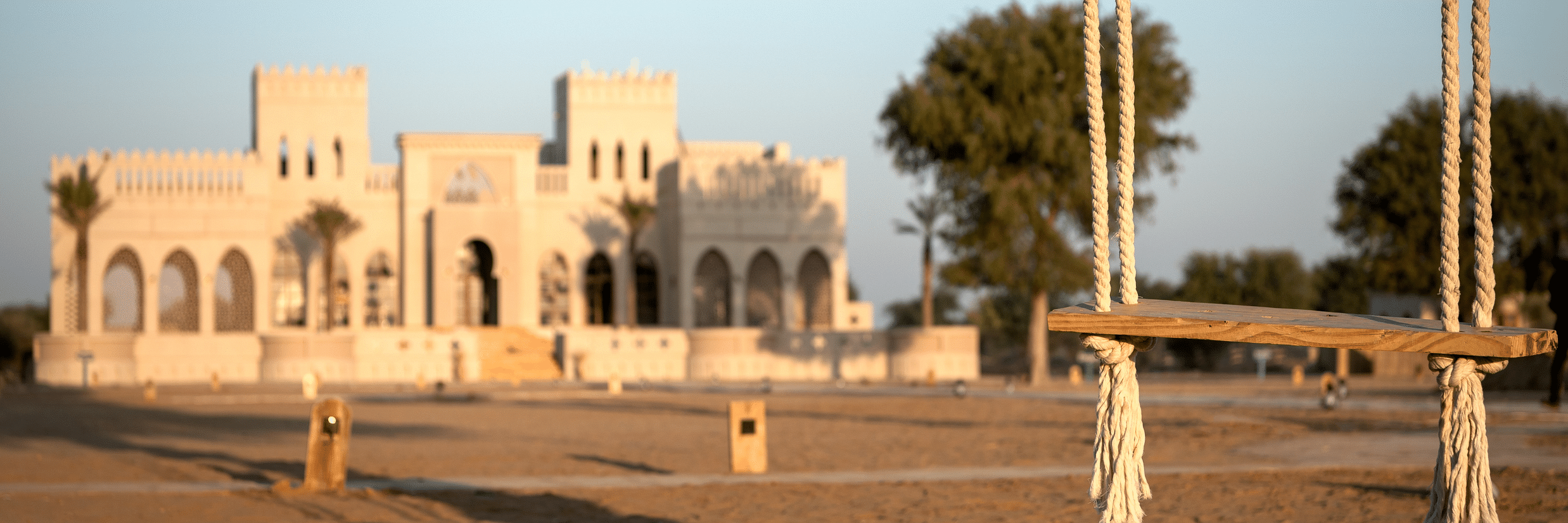 A swing with the hotel at the background - Karwaan Jaisalmer