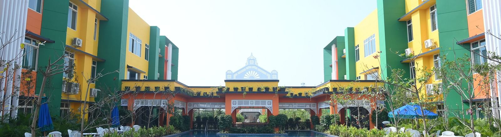 Wide view of Facade & Pool of of Mayfair World Cup Village, Rourkela 5