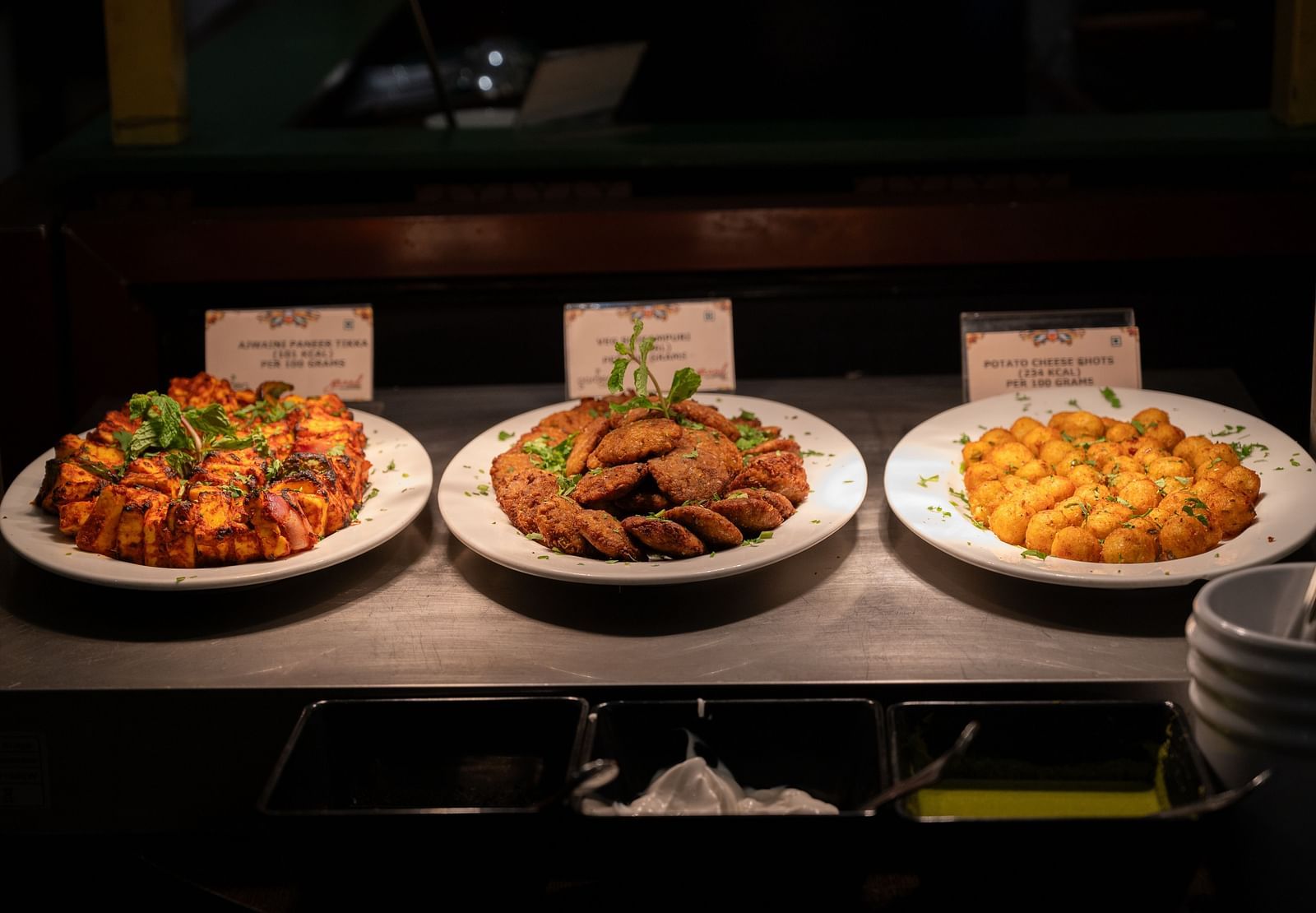 An image of three types of food arranged for display at Grand Kakinada by GRT Hotels