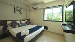 Executive room bed with beautiful view from window