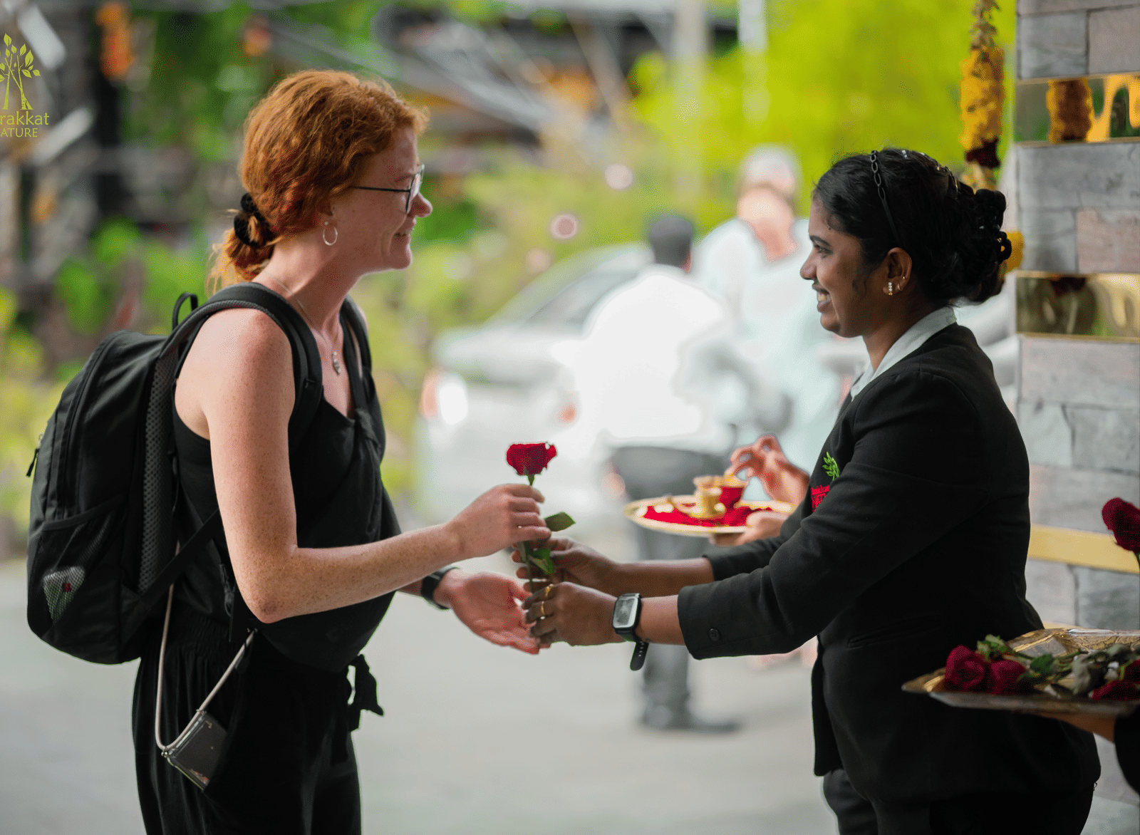 Staff offering rose to a Guest at Parakkat Nature Hotel & Resorts, Munnar 22