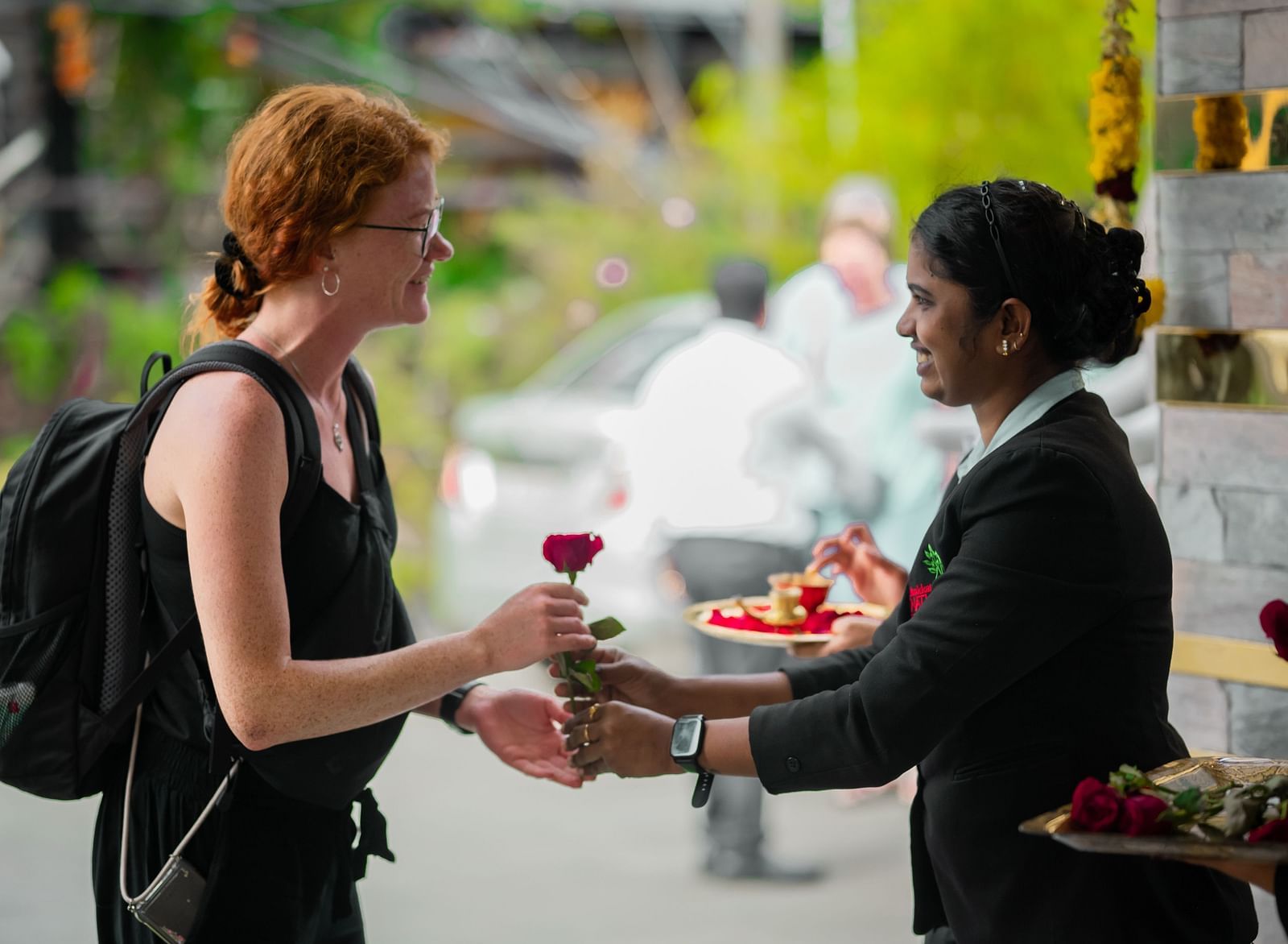 Staff offering rose to a Guest at Parakkat Nature Hotel & Resorts, Munnar 22