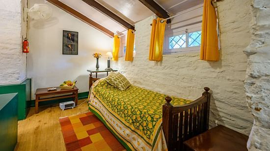 The Ramgarh Bungalows - room with a single bed at the Lemon Room