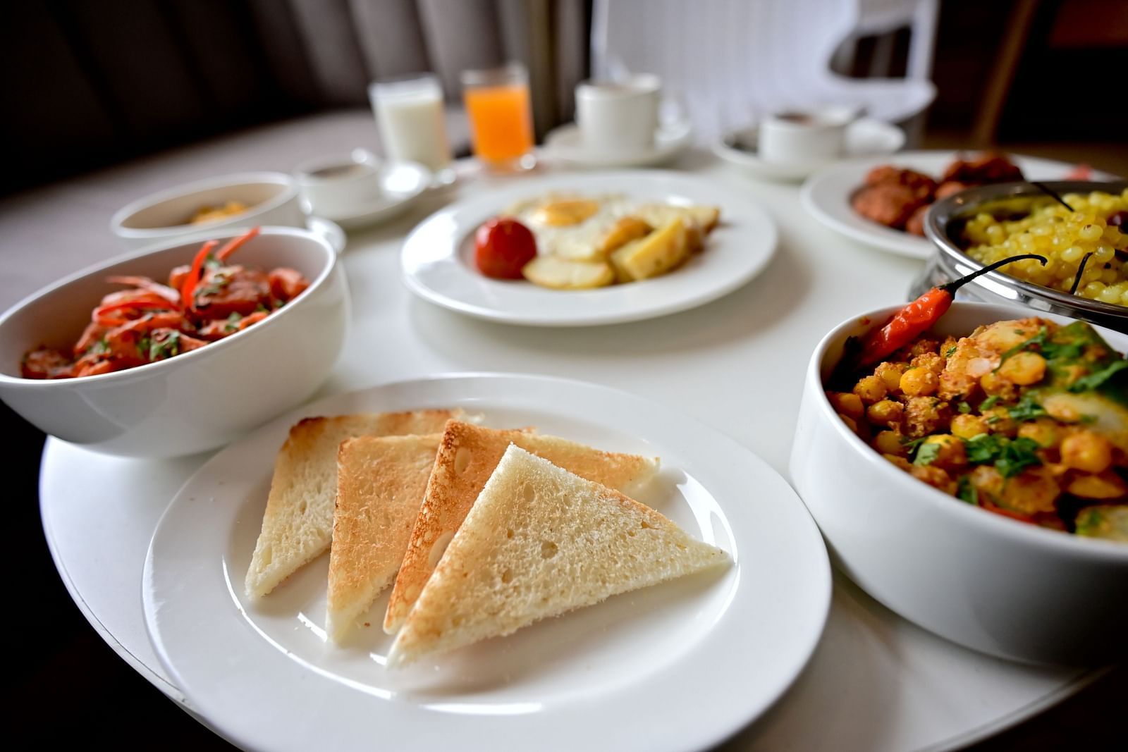 Image of plate with loaf and other food items at The Soma Hotel by Avianna Group, Darjeeling