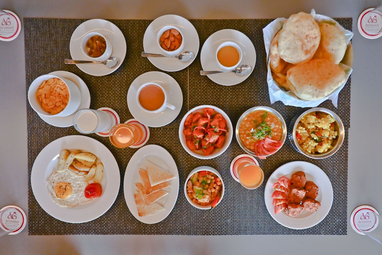 A table filled witn a variety of food items at The Soma Hotel by Avianna Group, Darjeeling