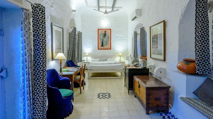 Hill Fort Kesroli 14th Century Alwar - interior view of Papiha Mahal room with blue and white decor