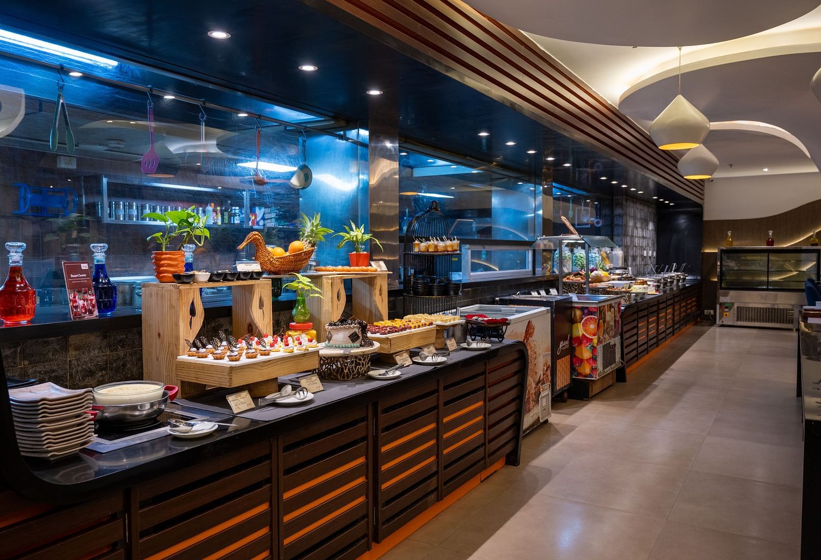 image of varieties of desserts arranged in the buffet area at  Grand Kakinada by GRT Hotels