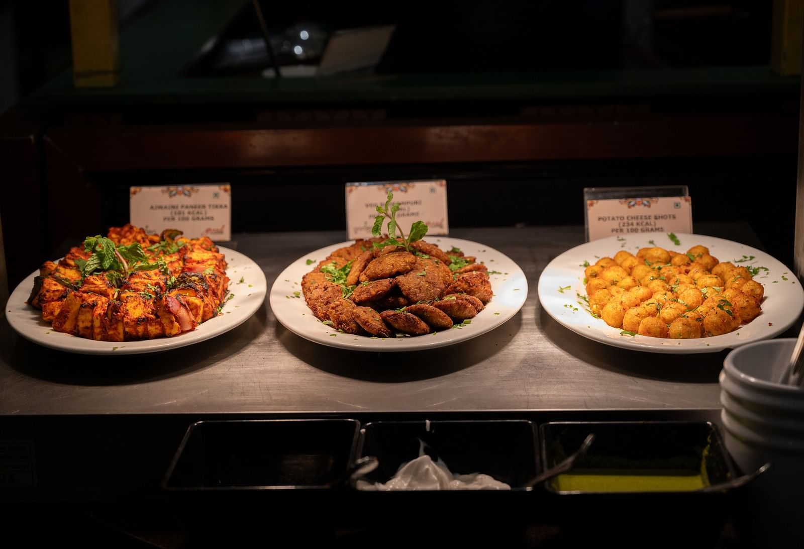 An image of three types of food arranged for display at Grand Kakinada by GRT Hotels