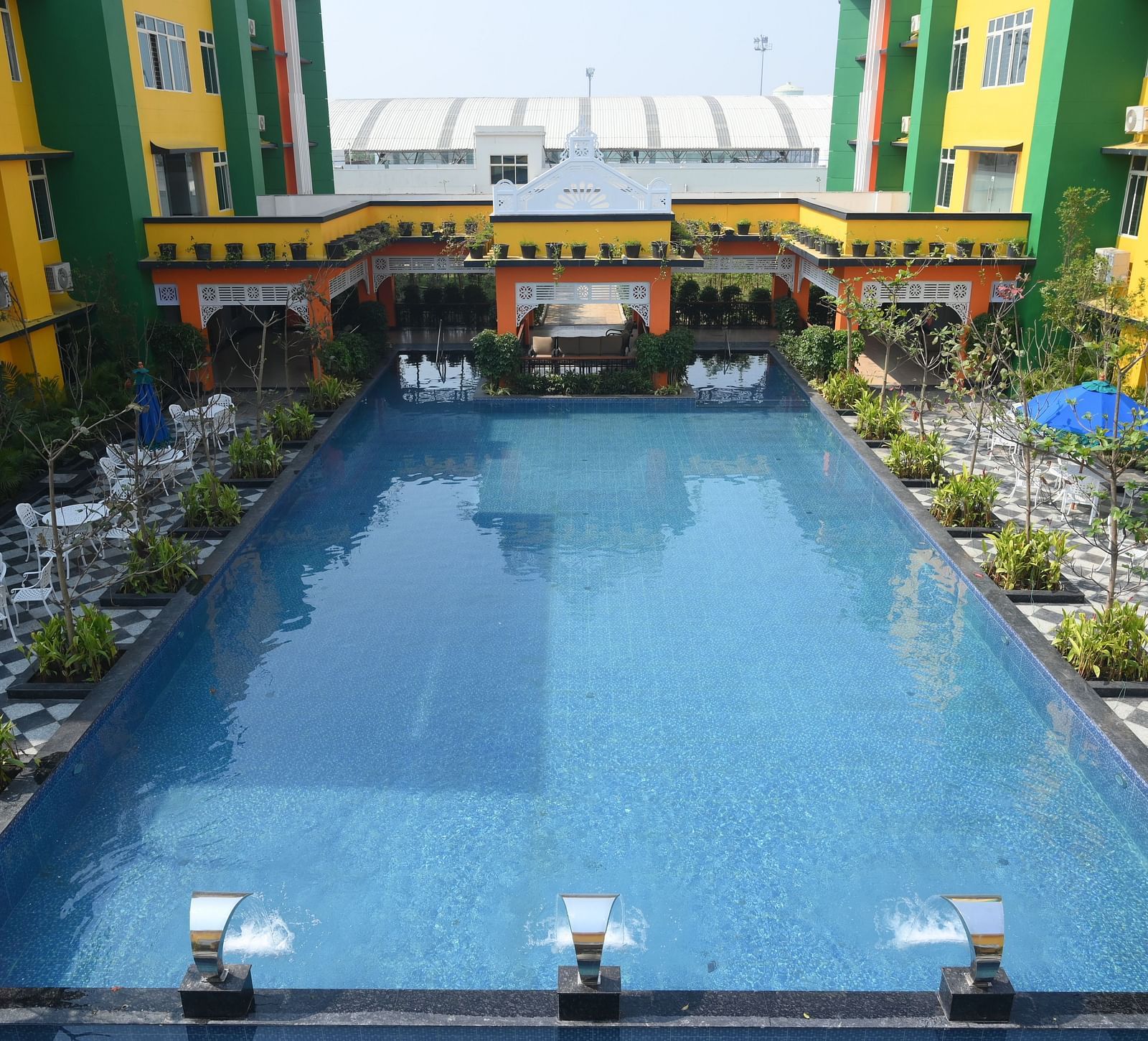Frontal view of the Swimming Pool at Mayfair World Cup Village Rourkela 3