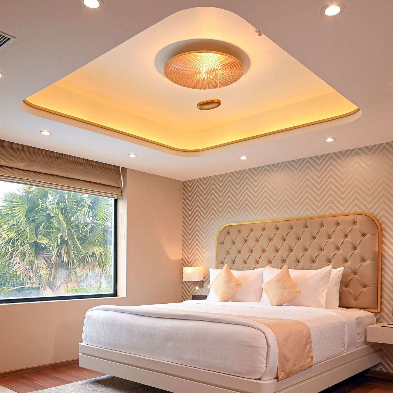 the bed at Superior Rooms in Kozhikode