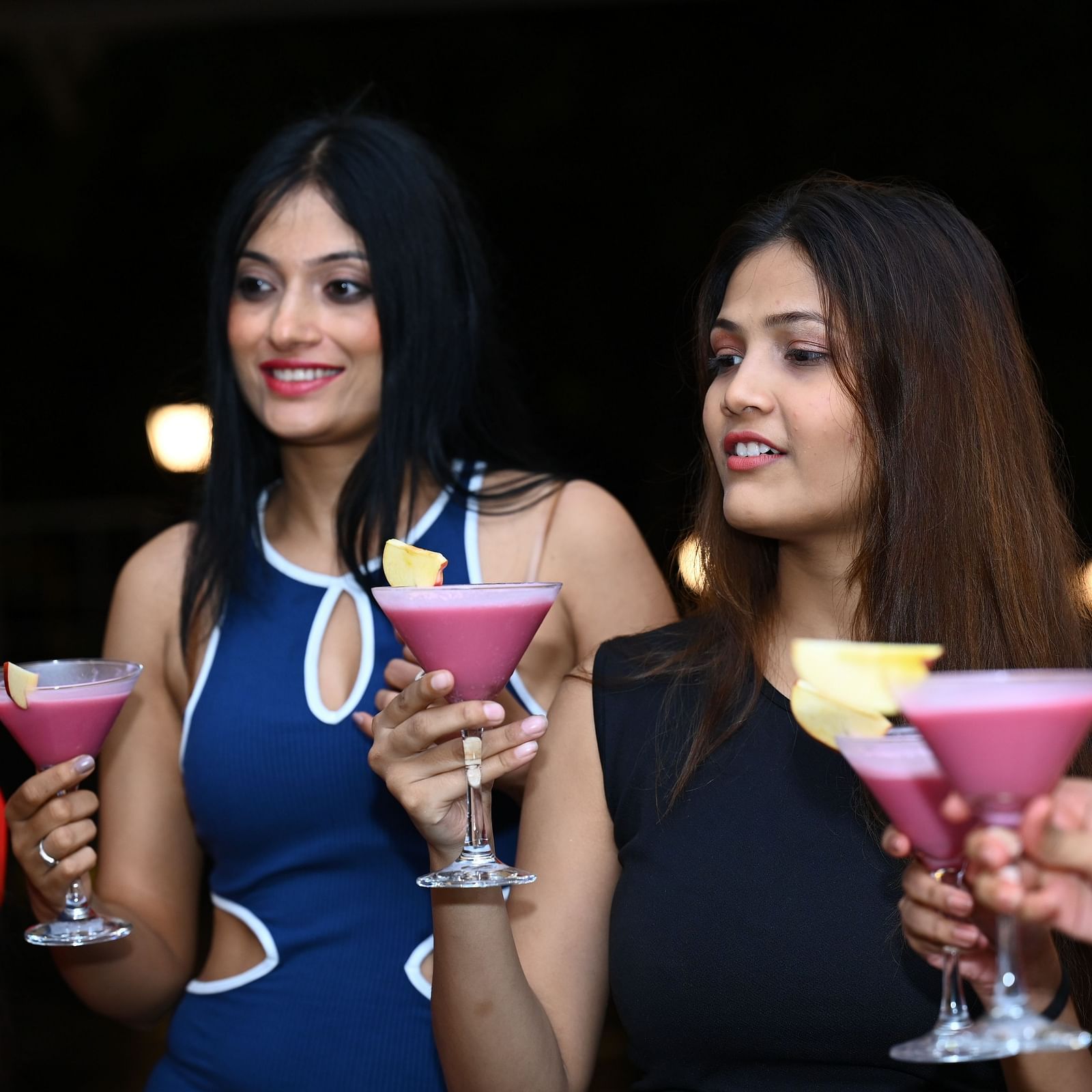 A group of women enjoying their beverages at the party | Diamond Parks, Pune