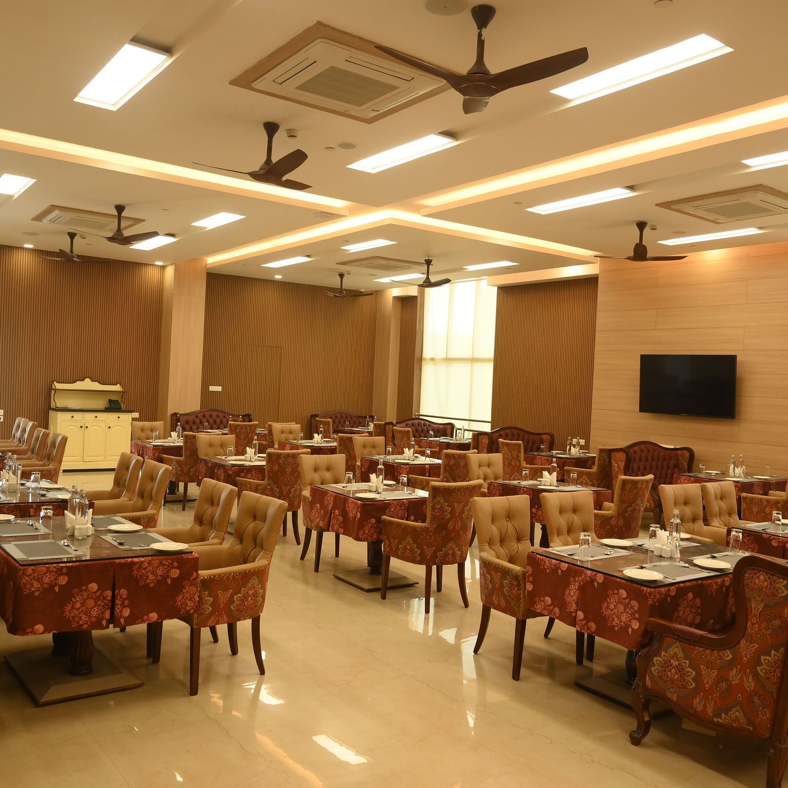 Side view of seating at Scoop Restaurant at Mayfair World Cup Village, Rourkela 2