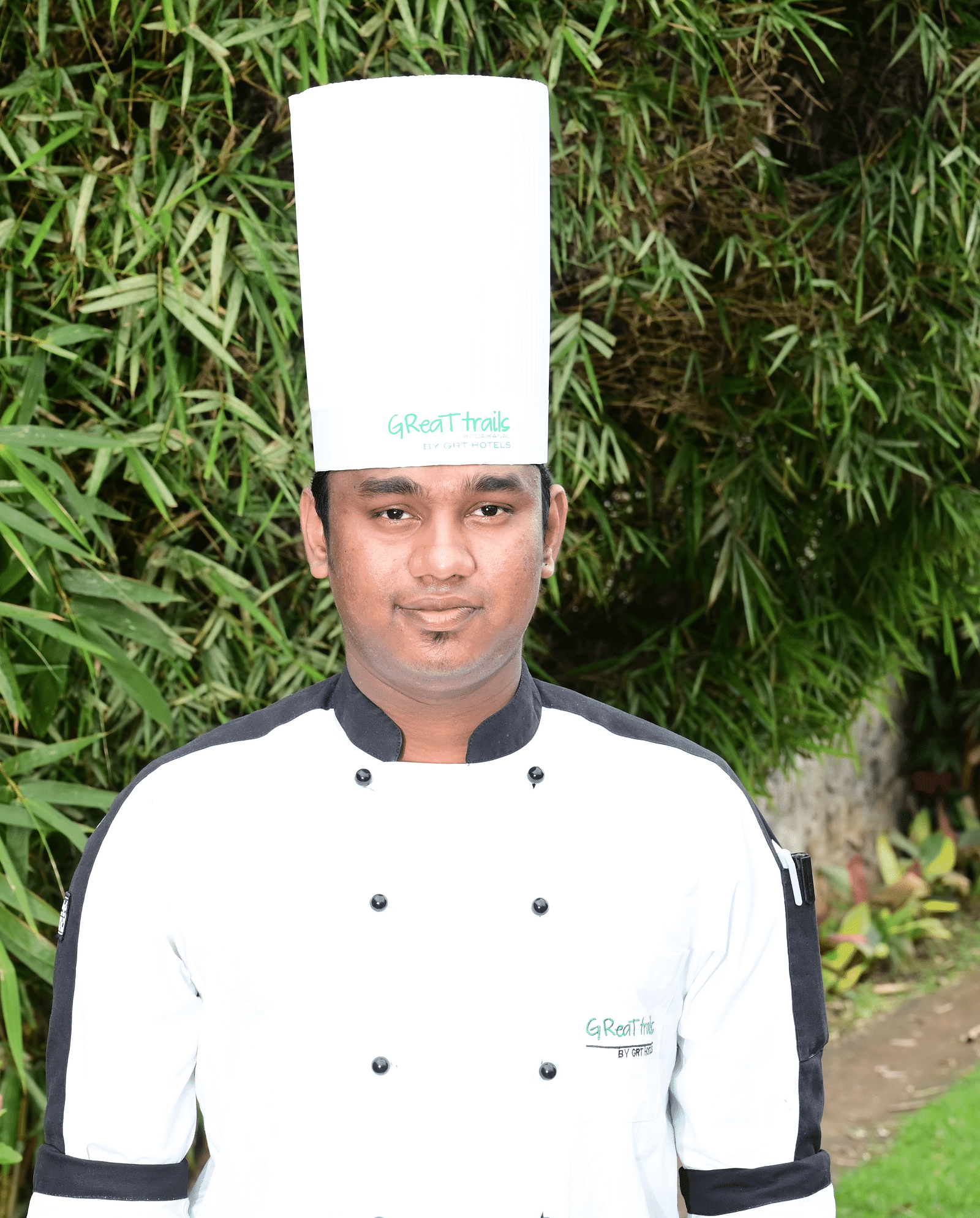 An image of a staff member of GReaT trails Kodaikanal by GRT Hotels