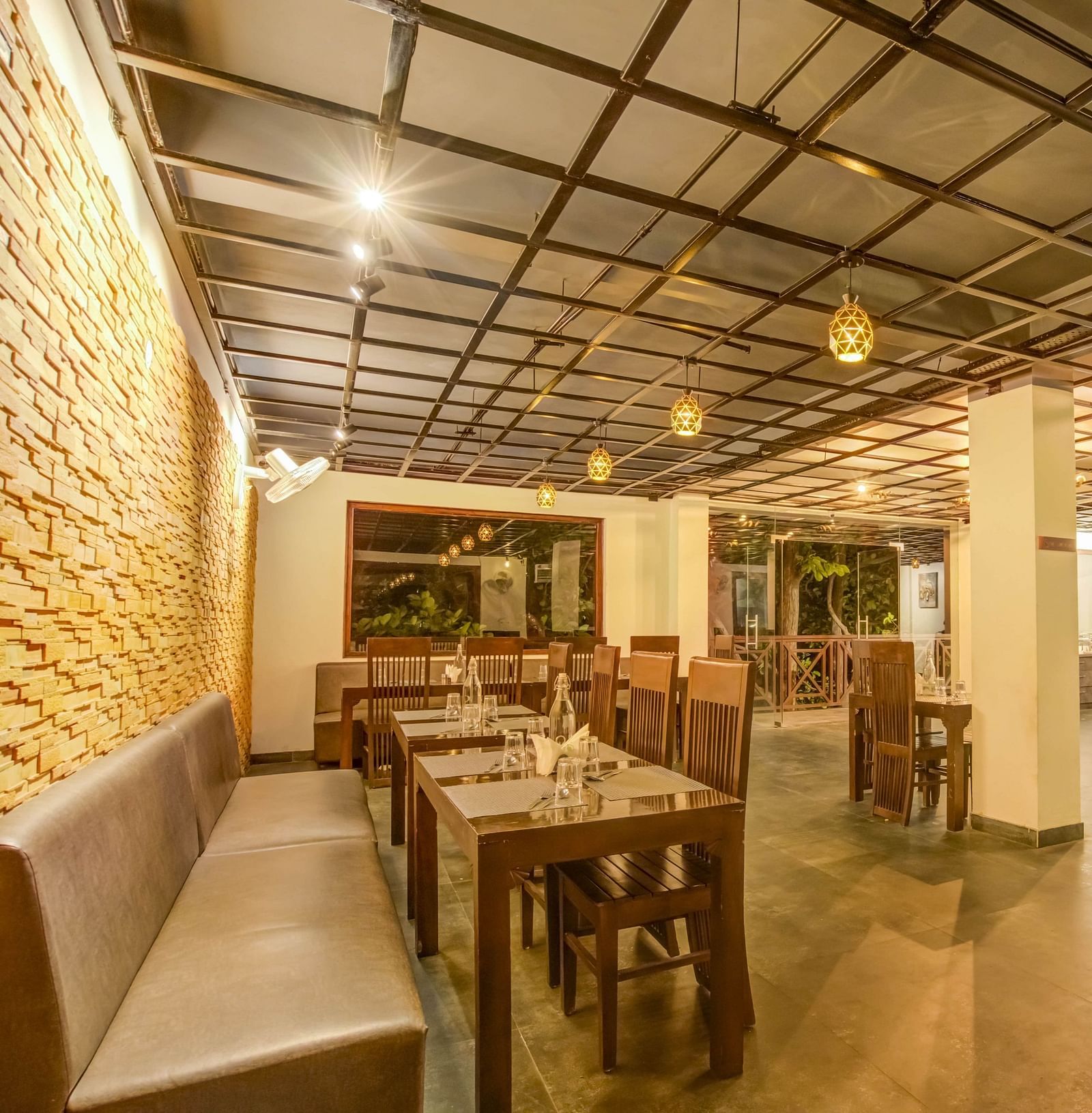 An image of a well-lit dinning hall - Summit Jungle Resort, Lansdowne