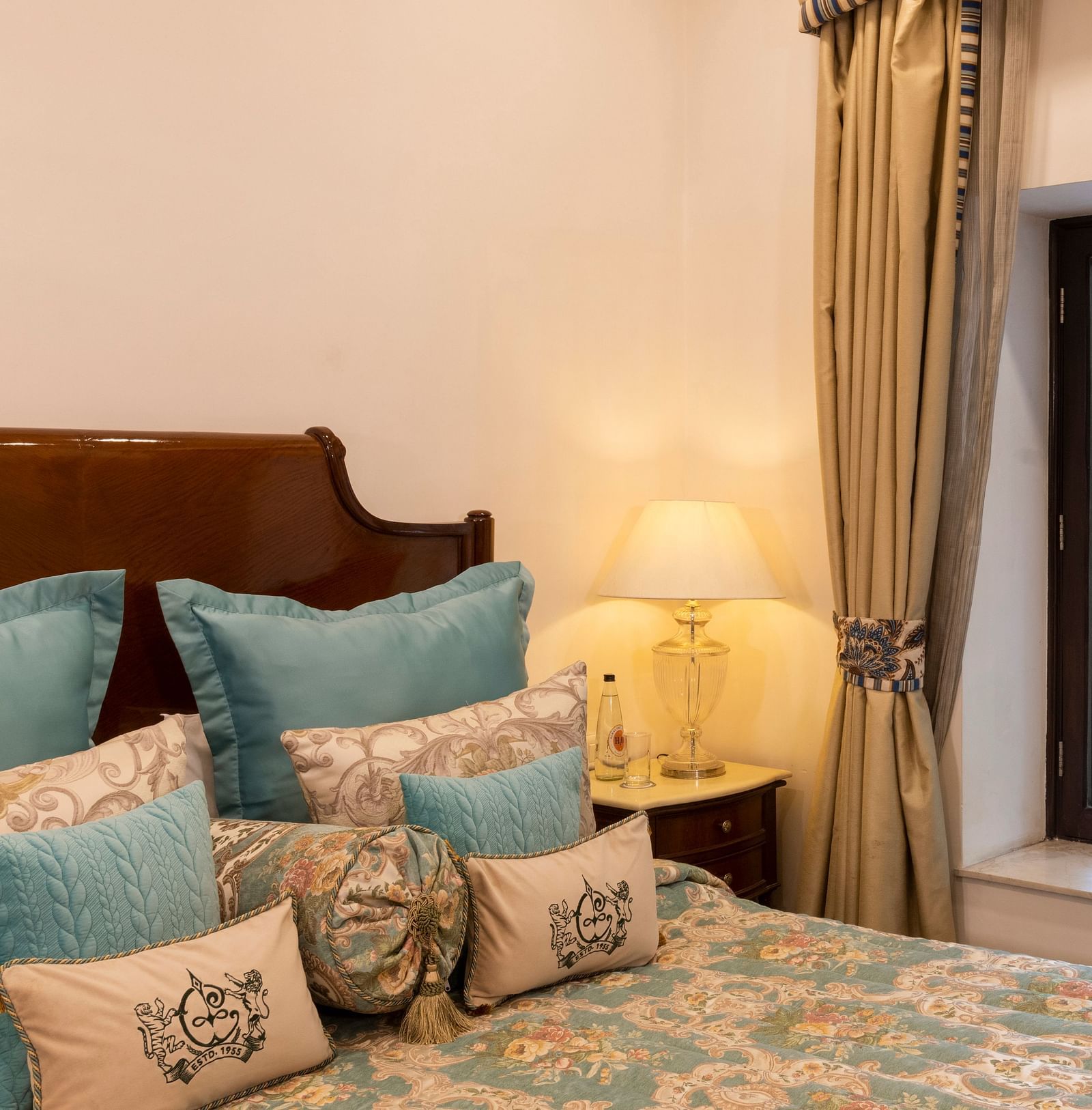 image of the window at the bed side of the Deluxe Room at The Claridges Nabha Residence