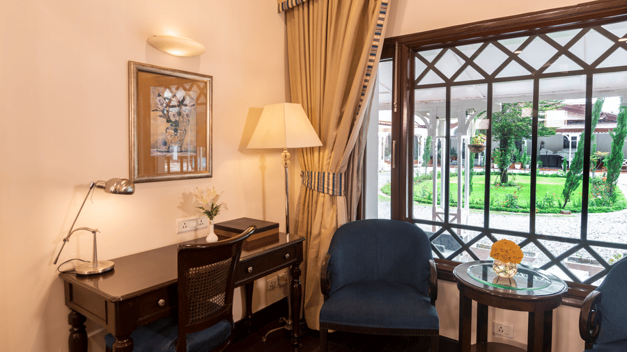 image of a seating area with a work desk at the Claridges Room at The Claridges Nabha Residence