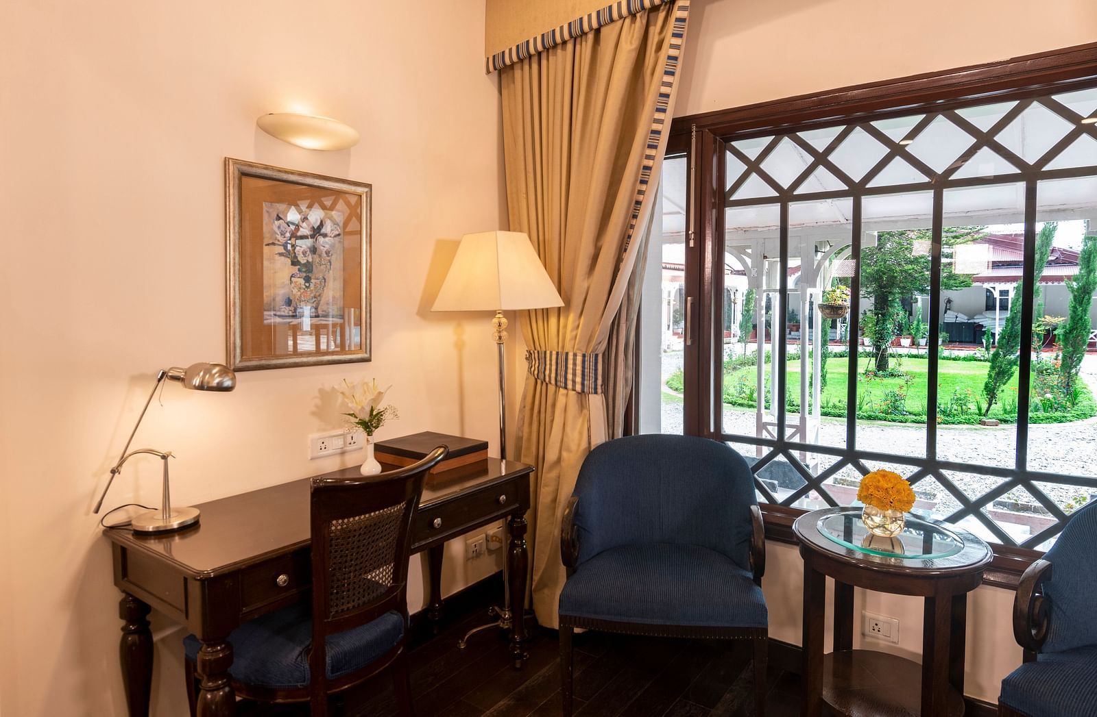 image of a seating area with a work desk at the Claridges Room at The Claridges Nabha Residence