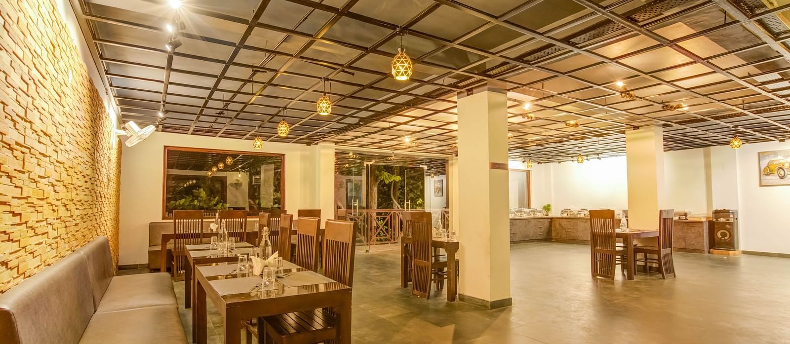 An image of a well-lit dinning hall - Summit Jungle Resort, Lansdowne