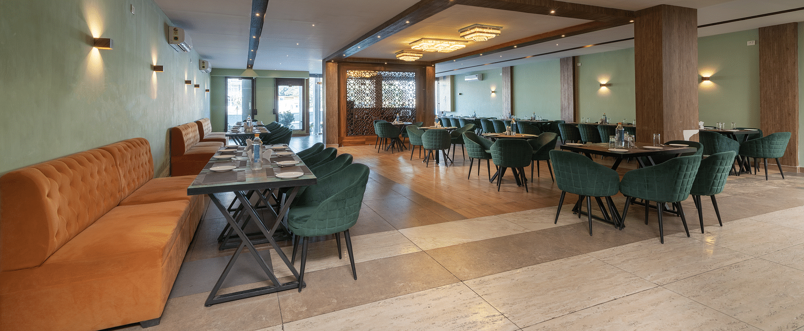 The restaurant image of DLS Ganga Bliss, Haridwar with chairs and tables