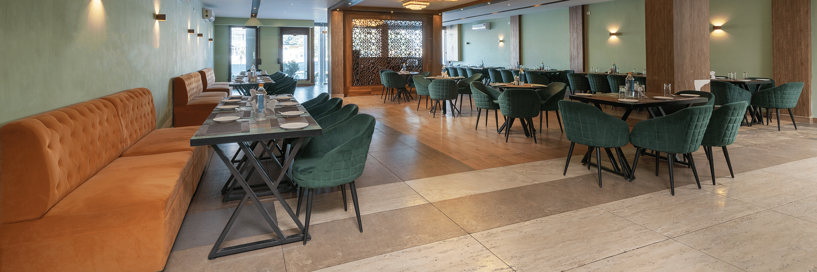 The restaurant image of DLS Ganga Bliss, Haridwar with chairs and tables