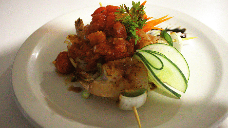 Seafood skewer topped with tomato salsa and zucchini ribbons - Hotel 39, Jamaica