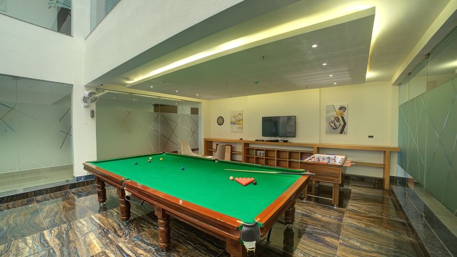 The gaming zone featuring a billiard table at Ilara Hotels & Spa, Tada.