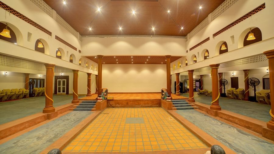 Spacious traditional hall with high ceilings and elegant arches at Kailash Conventions ECR.