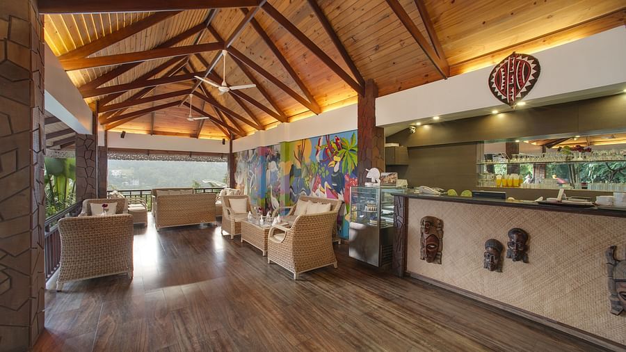 indoor seating space and the live kitchen counter - Mayfair Spa Resort & Casino Gangtok