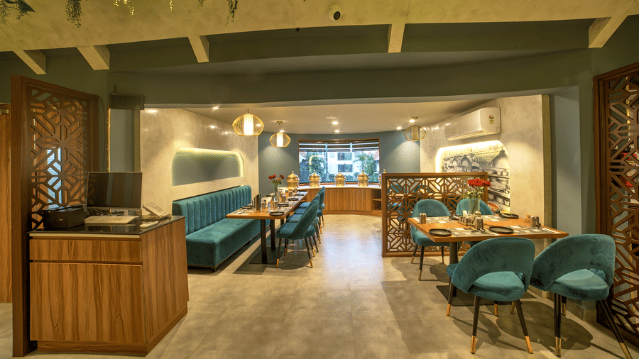 Contemporary restaurant entrance with open seating and soft lighting at Ilara Hotels & Spa, OMR, Chennai