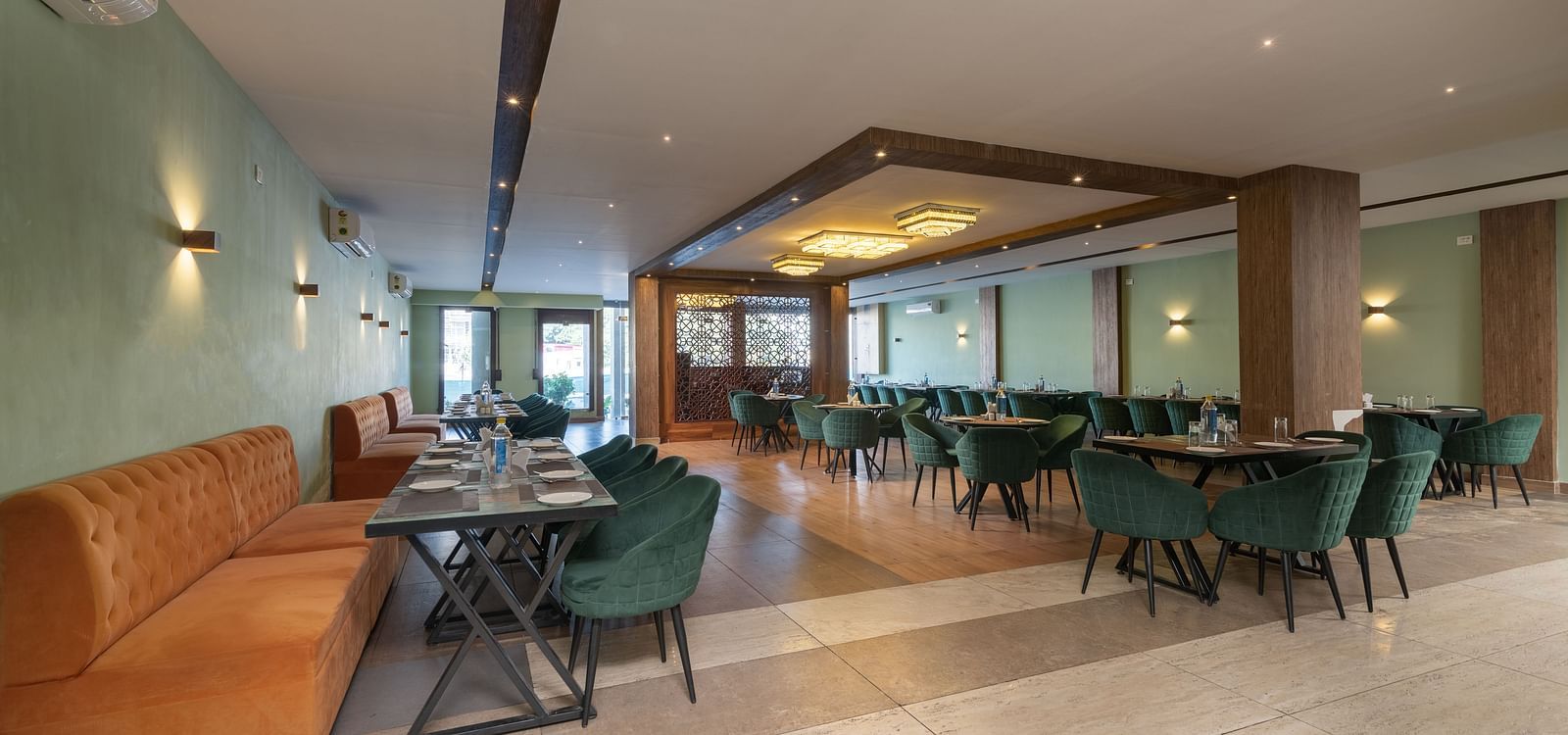 The restaurant image of DLS Ganga Bliss, Haridwar with chairs and tables