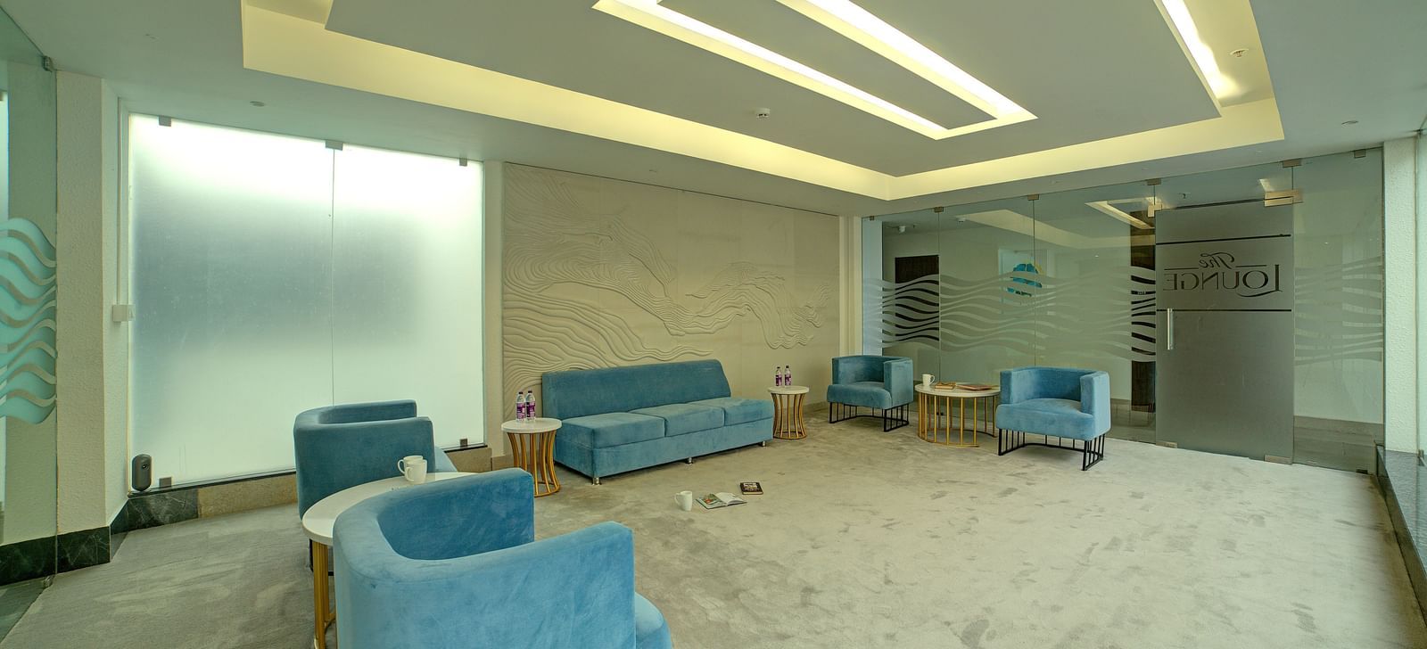 Full view shot of the lounge area with comfortable seating area with modern interiors at Ilara Hotels & Spa, Tada.