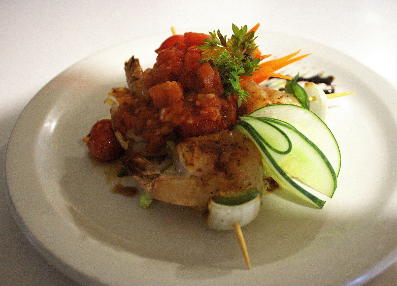 Seafood skewer topped with tomato salsa and zucchini ribbons - Hotel 39, Jamaica