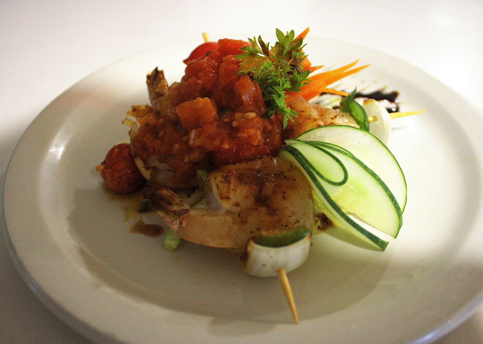 Seafood skewer topped with tomato salsa and zucchini ribbons - Hotel 39, Jamaica