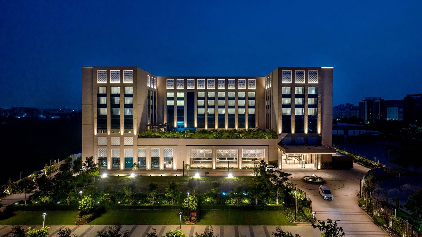 Front view of Grand Chennai By GRT Hotels during evening time.