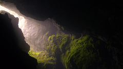 Photo of light passing in through a cave.