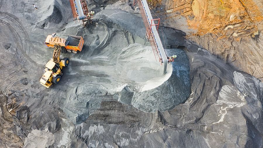 Two trucks in a coal mine