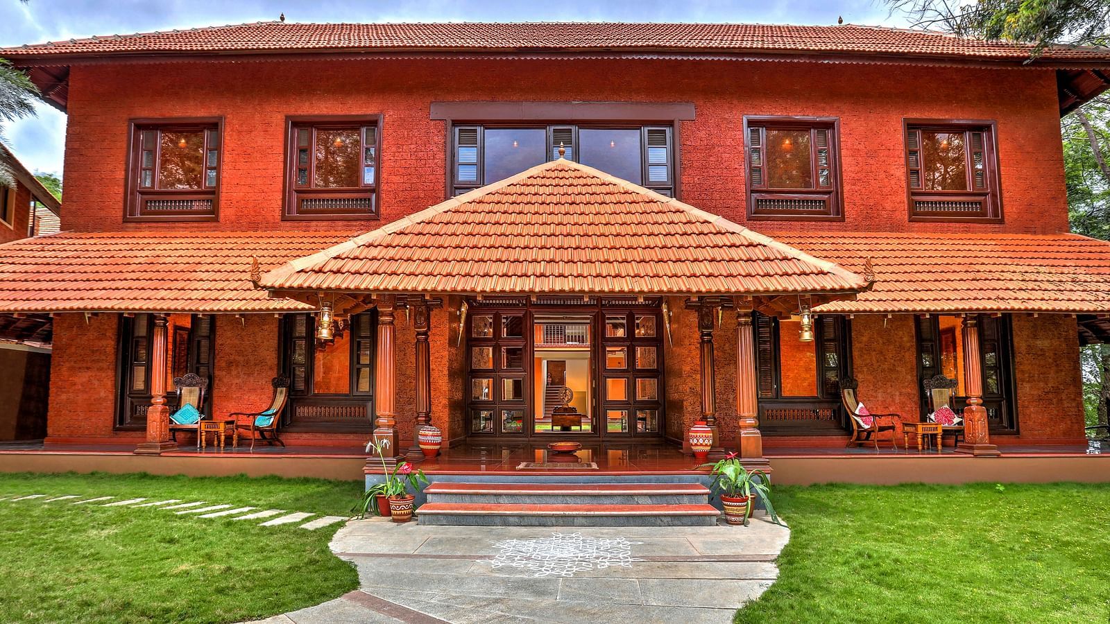 facade image of the malnad palace at hoysala village resort, hassan.