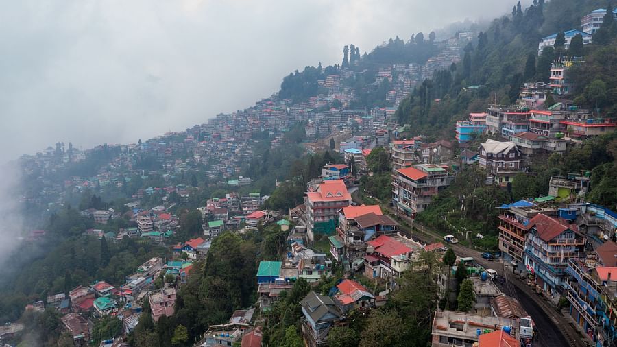 A long Drone shot covering the nearby houses and properties - Arcadia Heritage Resort, Darjeeling.