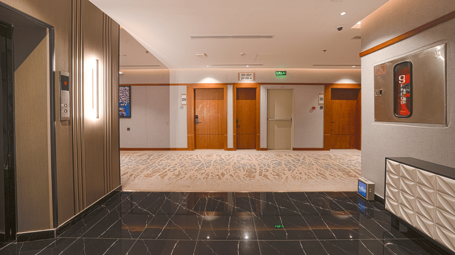 Common corridor and waiting area for the elevator at Grand Iva Hotel, Abha.