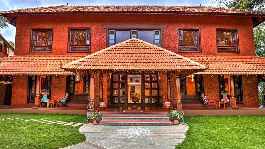 facade image of the malnad palace at hoysala village resort, hassan.