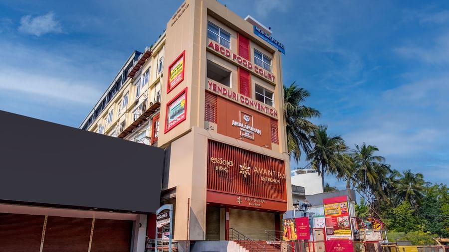 Street-side exterior of Monday Hotels Amalapuram Heights.