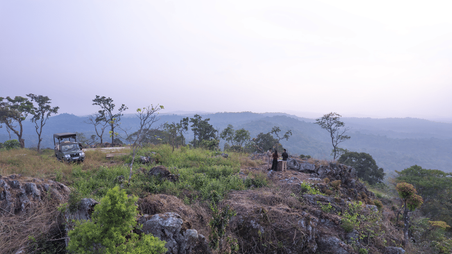 Panoramic misty valley view from a hilltop near Evolve Back Coorg