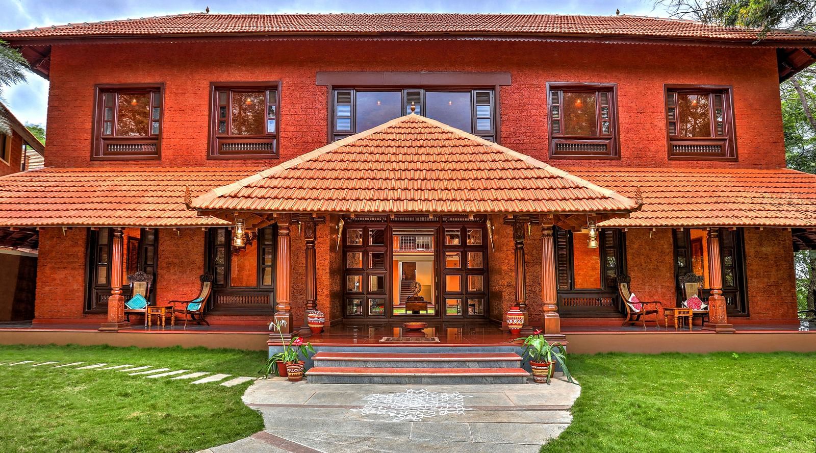 facade image of the malnad palace at hoysala village resort, hassan.