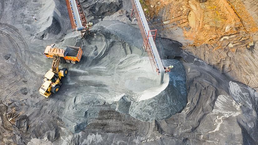 Two trucks in a coal mine