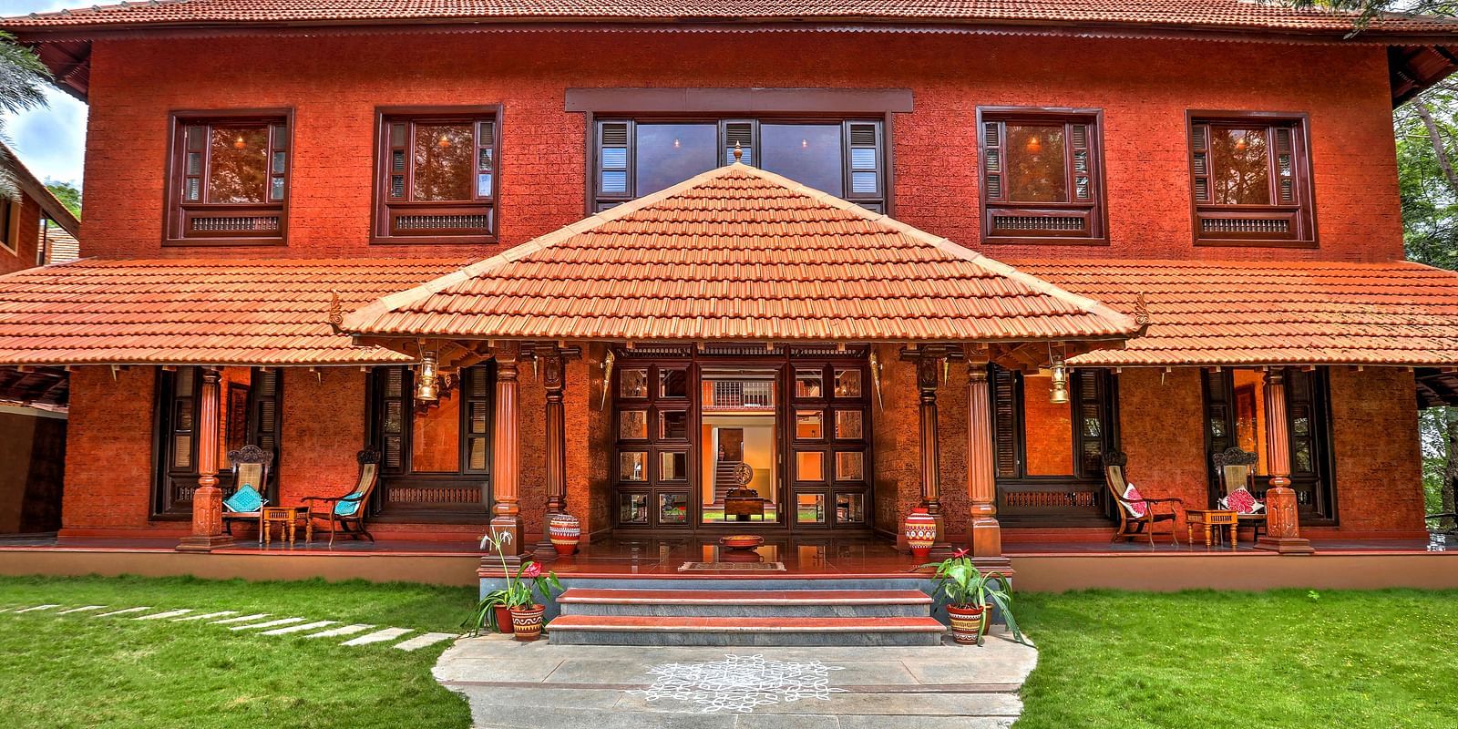 facade image of the malnad palace at hoysala village resort, hassan.