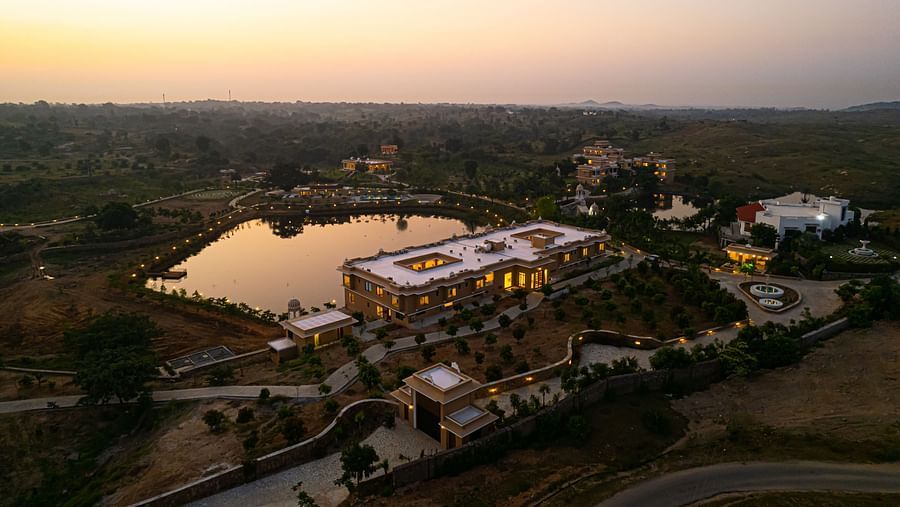 Aerial view of the wellness centre during twilight with serene views - Rajbagh Wellness