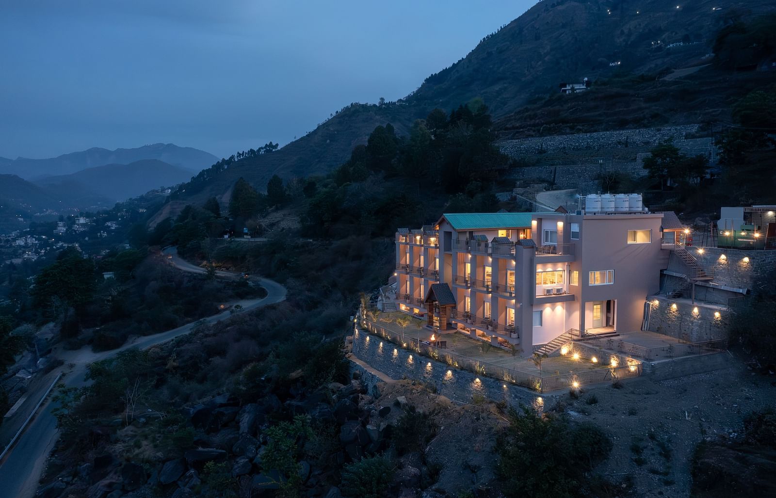 facade of Leisure Hotel at dusk 