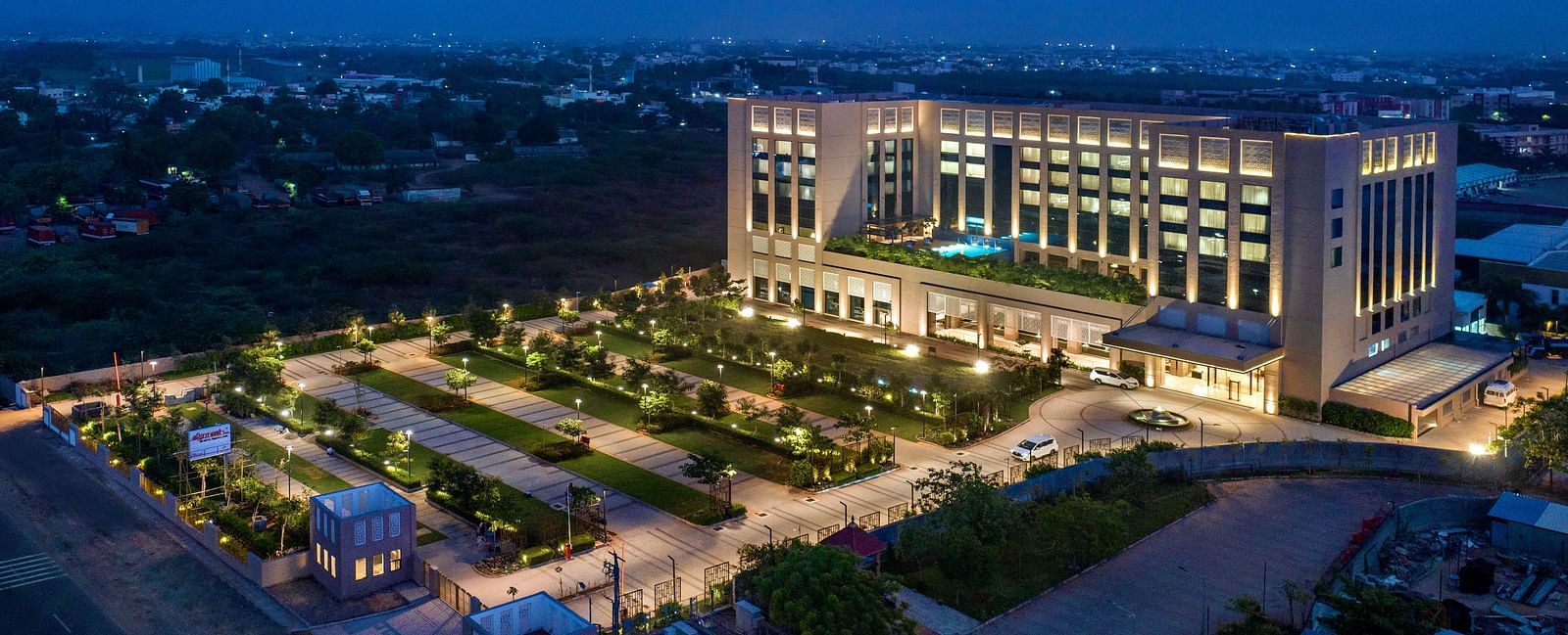 Side view of Grand Chennai By GRT Hotels during evening time.