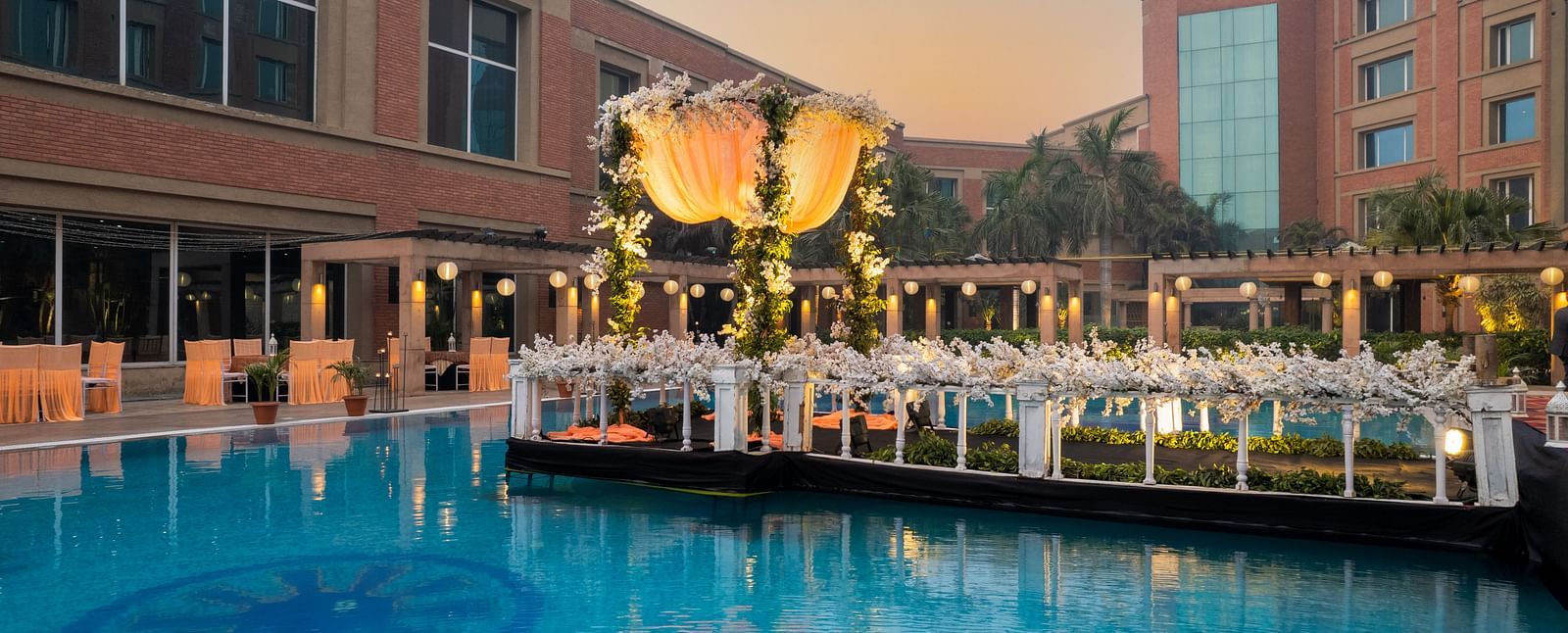 Lavish outdoor decoration of a pool at Nirvana Luxury Hotel, Ludhiana