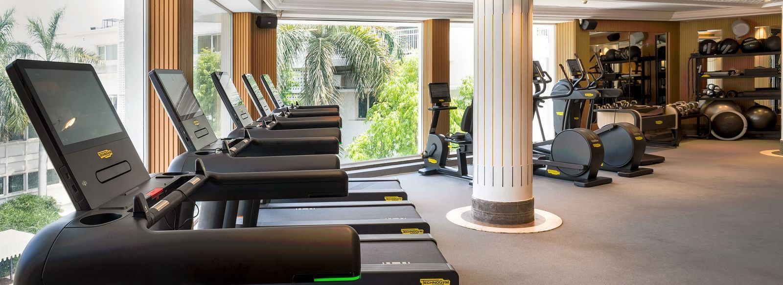 Side veiw  the gym with thread mill at The Claridges New Delhi